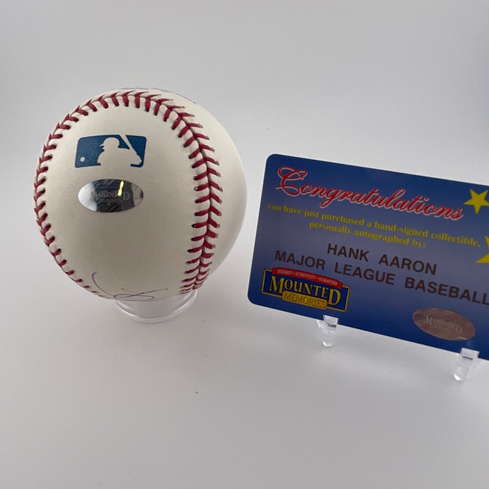 Hank Aaron Single Signed Baseball. Atlanta Braves. Mounted Memories