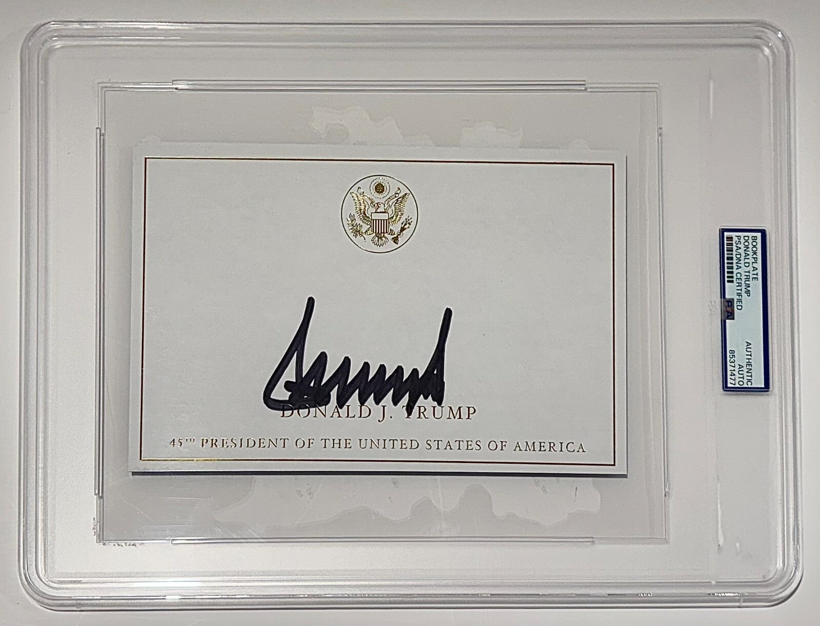 President Donald Trump Signed Autograph Page, Gold Executive Seal. PSA1