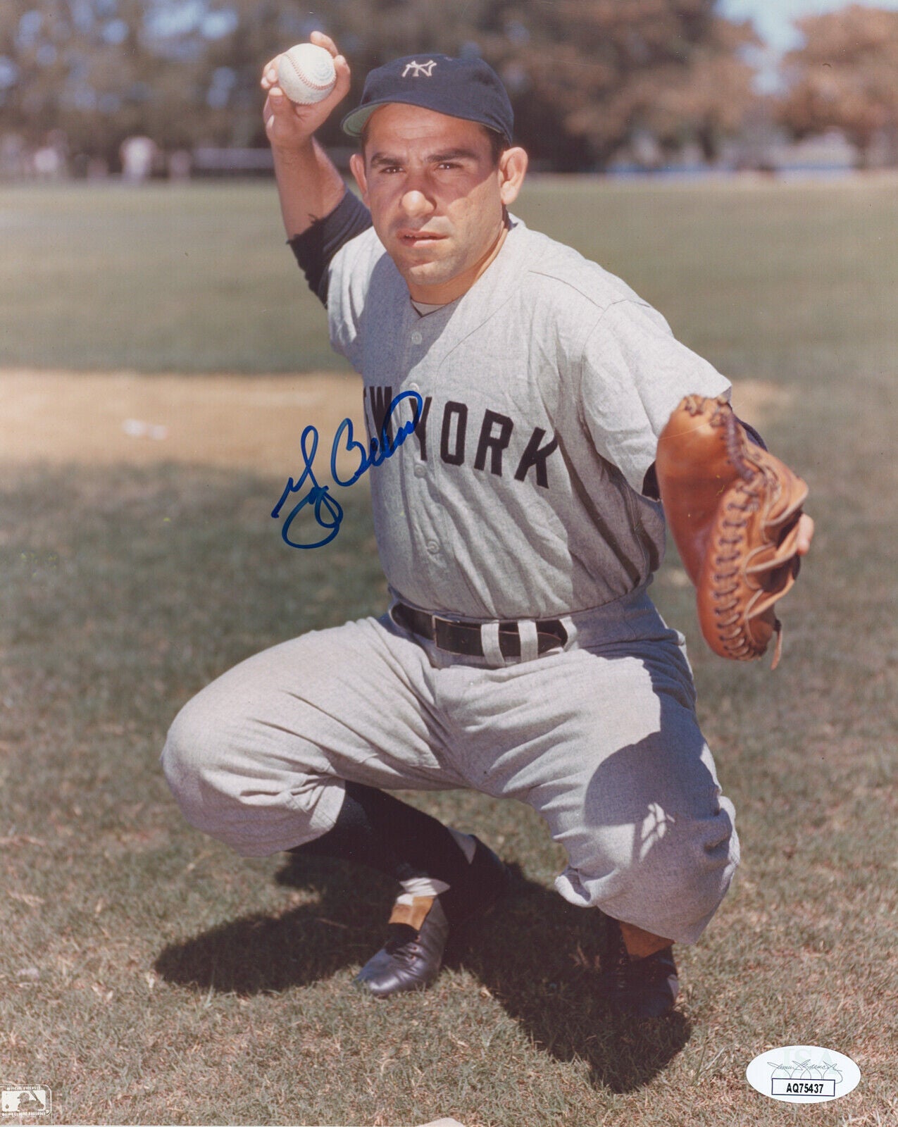 Yogi Berra 8x10 Signed Throwing Photo, New York Yankees HOF. Auto JSA