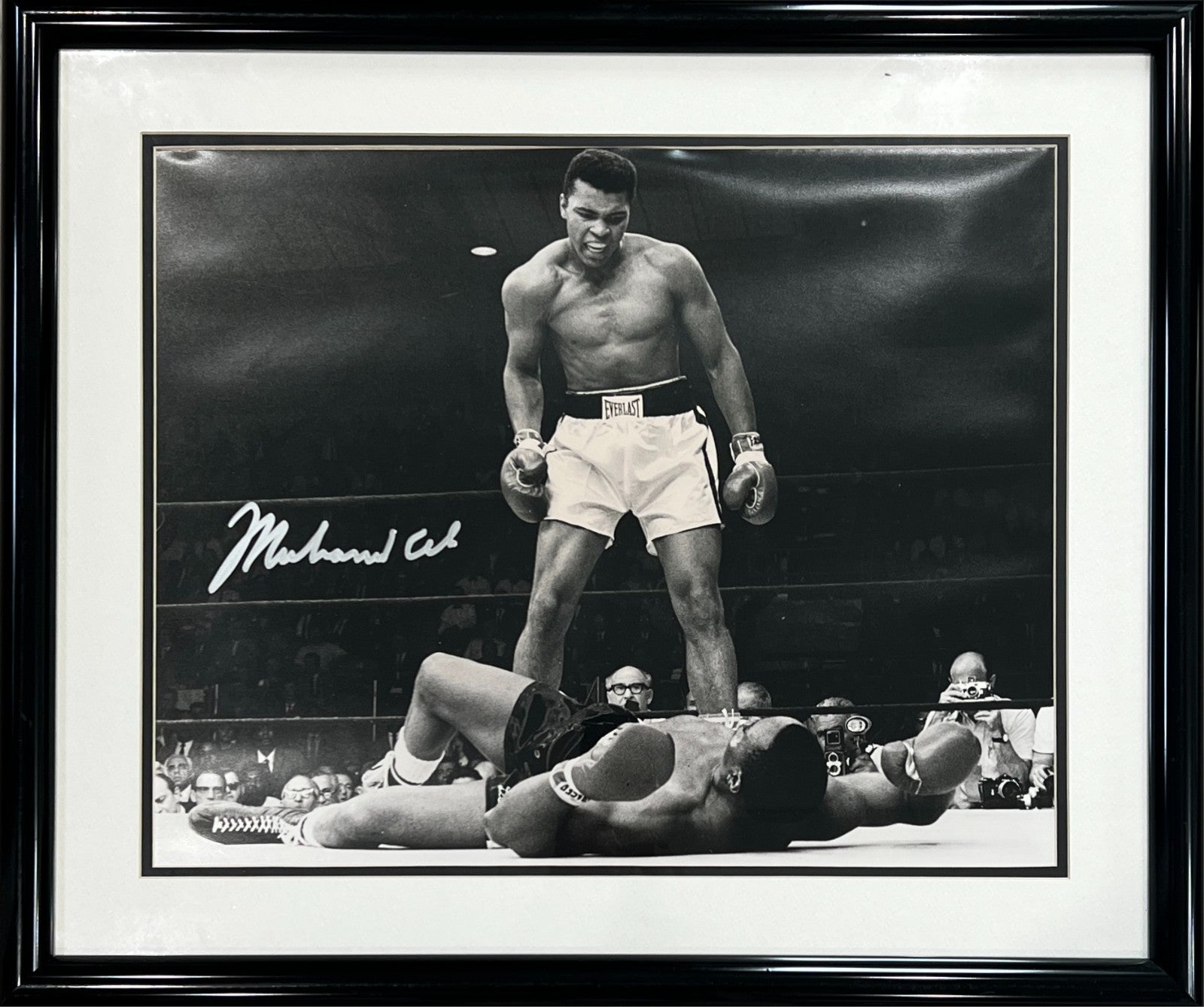 Muhammad Ali Signed 16" x 20" Photo. Ali over Liston. PSA LOA0