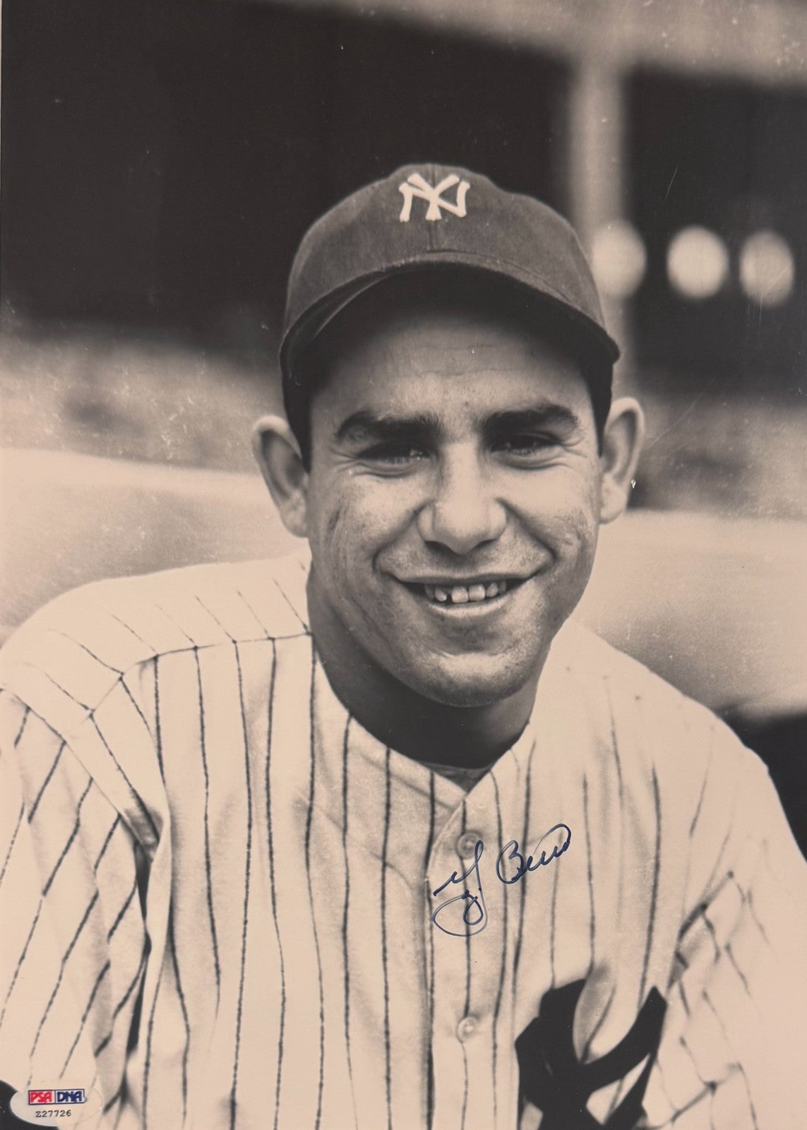 Yogi Berra Signed 11" x 14" Photo. PSA1